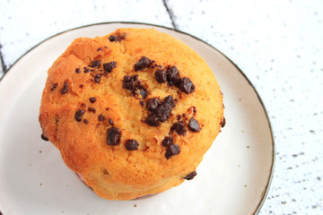 Chocolate Chip Muffin isolated on white