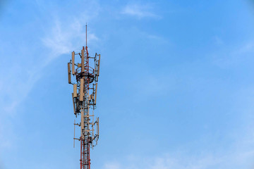 Antenna and telecommunication tower in blue sky background