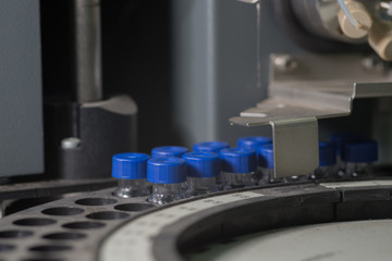 Sample vials in line waiting for analysis