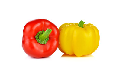 Two fresh peppers isolated on white background
