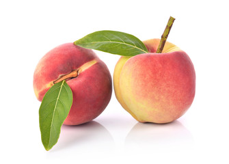 Fresh peaches fruit on white background