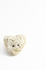 Natural stone in the form of heart. Space for text