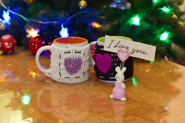  pair of cups of tea on the table against