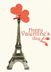 Fototapeta na wymiar Eiffel tower and hand with paper hearts on white. Paris cards as