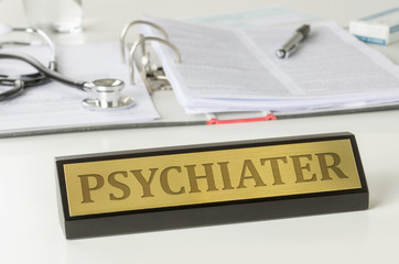 Tischaufsteller mit der Aufschift Psychiater