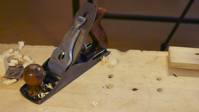 Hand jack plane, wood chips and sawdust