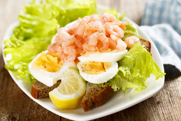 Sandwich with boiled egg and shrimps