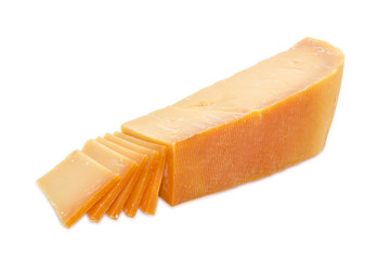 Piece and several slices of Dutch cheese