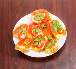 Sandwiches made with baguette, butter and salted trout
