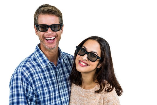 Cheerful couple wearing sunglasses