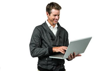 Cheerful man using laptop