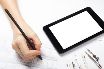 Architect working on blueprint. Architects workplace - architectural project, blueprints, ruler,...