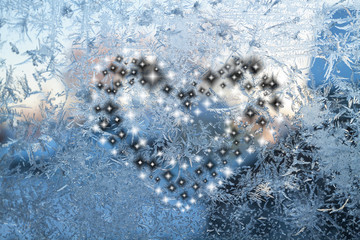 Black and white heart on the ice surface