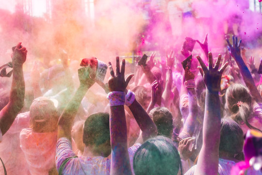 people covered with colored powder. Color Run Thailand