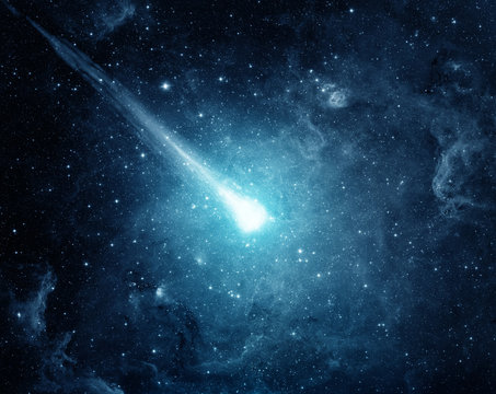 Fototapeta Comet in the starry sky. Elements of this image furnished by NASA.