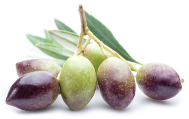 Fresh olives with leaves on the white background.