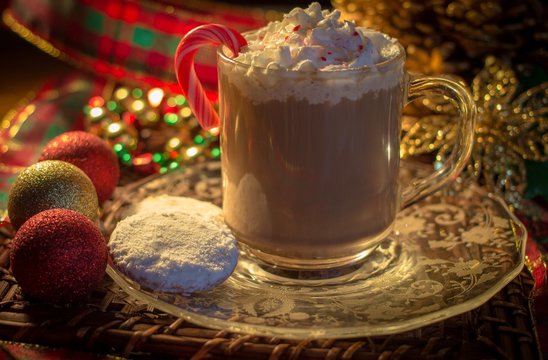 Peppermint Latte. Hot cup of peppermint latte surrounded by holiday decor.