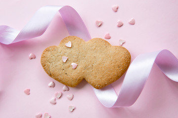 Sweet cookies in the shape of hearts for Valentine's Day on a pi
