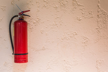 Obraz premium Red fire extinguisher.