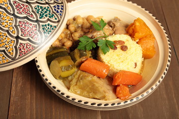 Couscous in a clay pot with drawings