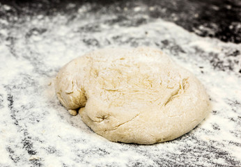 cake mixture with flour over slate