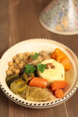 Couscous in a clay pot with drawings
