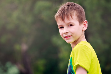 Outdoors portrait of a young boy