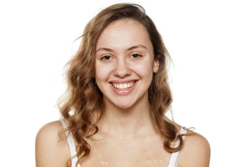 portrait of happy young woman without make-up