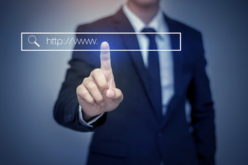 business man clicking internet search page on computer touch scr