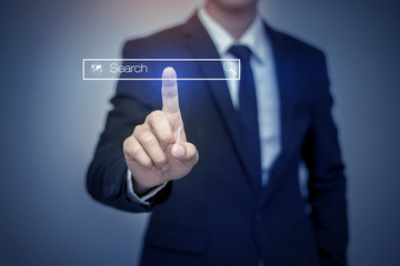 business man clicking internet search page on computer touch scr