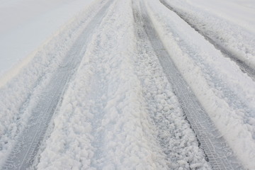 Grooves of the tire in the snow road