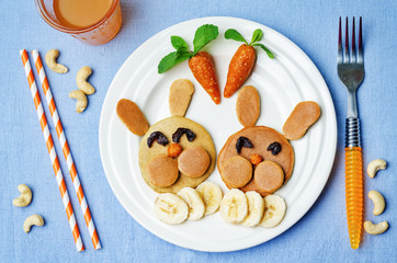 Pancake in the form of a rabbit and dried apricots cashew carrot