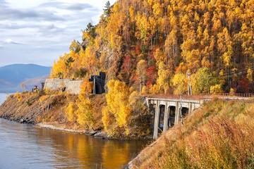 Fototapeta na wymiar Circum-Baikal Railway on a background autumn forest.