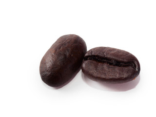 two coffee beans on white background