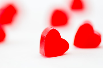 red jelly hearts on a white background