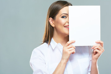 Business woman hide face behind white sign board