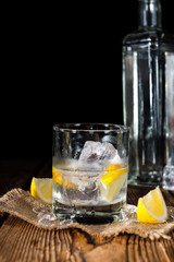 Pure Vodka (on an old wooden table)