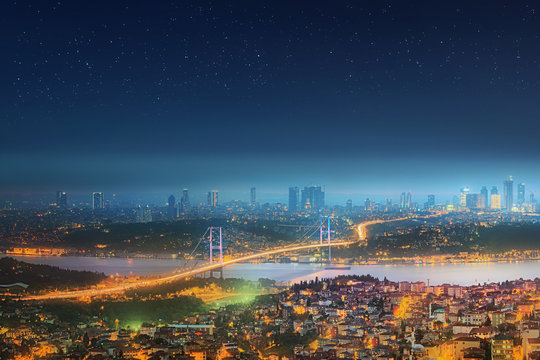 Panorama of Istanbul and Bosphorus bridge at night