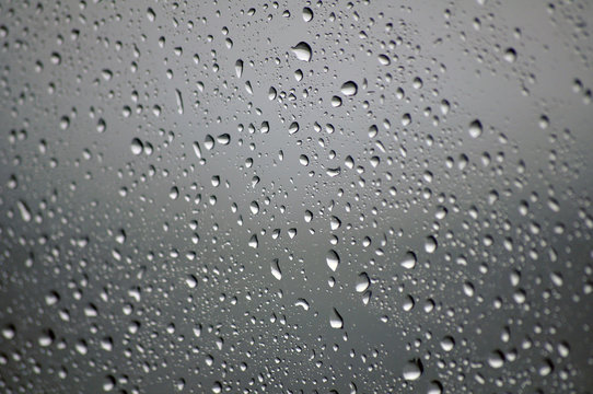 raindrops on glass, shallow focus