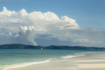 Smoke fire cloud on a beach landscape
