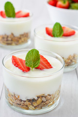 Yogurt with cereals and strawberries