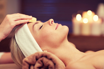 close up of woman having face cleaning in spa