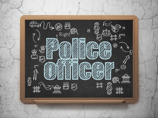 Law concept: Police Officer on School Board background