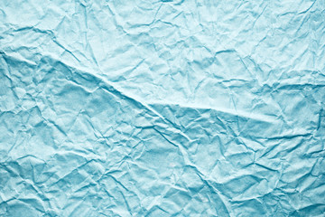 Crumpled blue paper