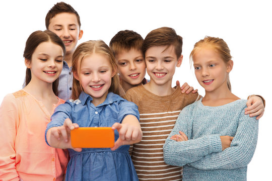 happy children talking selfie by smartphone