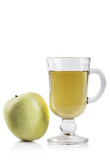 green Apple and glass of juice isolated on white