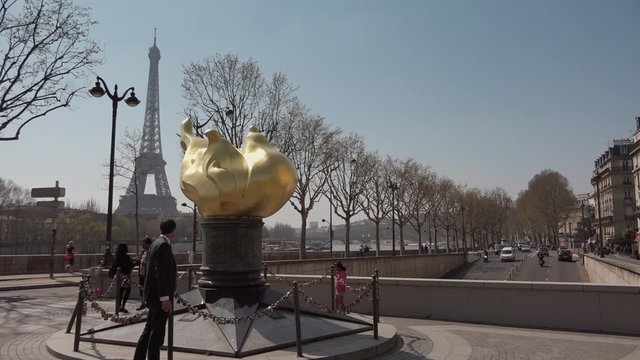 Time lapse Diana Memorial Eiffel Tower, Paris. The Flame of Liberty in Paris is a full-sized, gold-leaf-covered replica of the new flame of the Statue of Liberty in New York City.