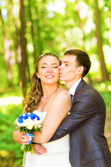 Wedding bouquet. Bride and groom.