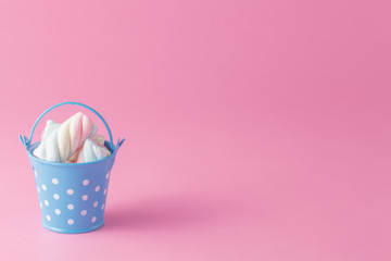 Group of twisted marshmallow in bucket