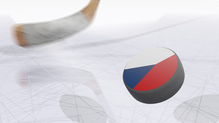 Hockey sticks and hockey puck with the image of the Czech flag with ice in background.
